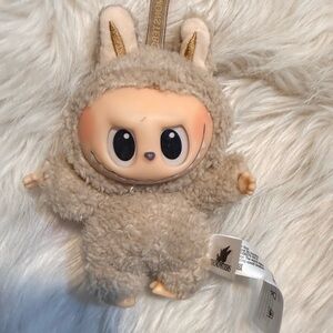 Pop Mart the Monsters Labubu complete with tiny scar on face - meet Toffee!